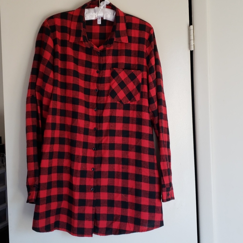 Tunic length plaid top with roll tab sleeves